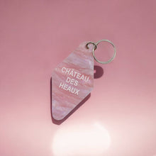 Load image into Gallery viewer, Château des Heaux Motel Keychain in Crystal Pink