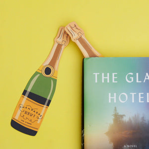 "Champagne bottle-shaped die-cut bookmark"

"Novelty bookmark resembling a champagne bottle"

"Unique die-cut bookmark for book enthusiasts"